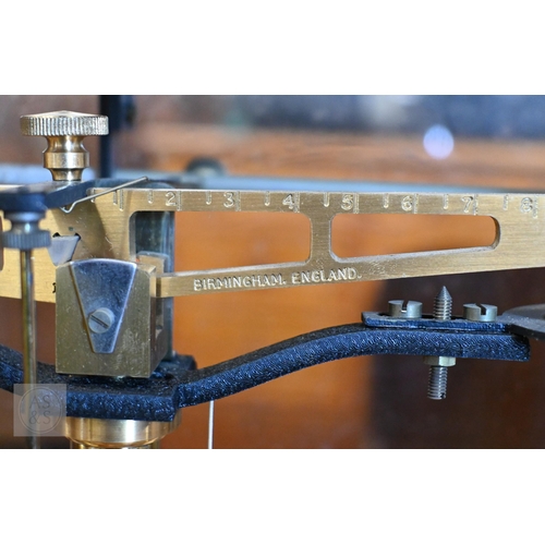 374 - #A vintage chemical balance in glazed case