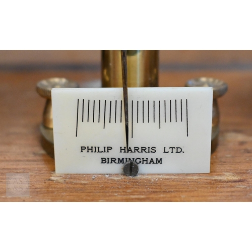 374 - #A vintage chemical balance in glazed case