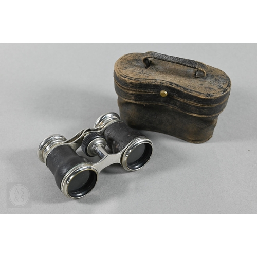 380 - An antique lacquered brass bearing compass in leather case, by Elliot Bros, London, to/w an ep colla... 