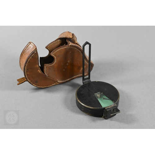 380 - An antique lacquered brass bearing compass in leather case, by Elliot Bros, London, to/w an ep colla... 