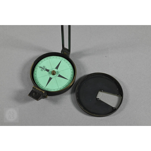 380 - An antique lacquered brass bearing compass in leather case, by Elliot Bros, London, to/w an ep colla... 