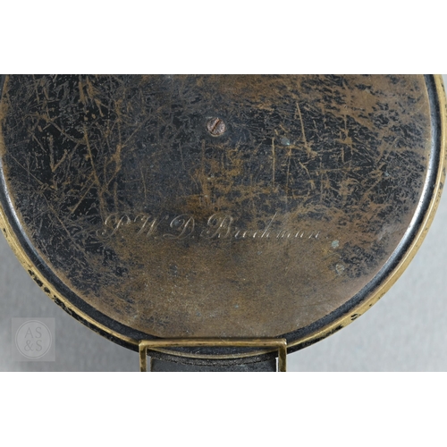 380 - An antique lacquered brass bearing compass in leather case, by Elliot Bros, London, to/w an ep colla... 