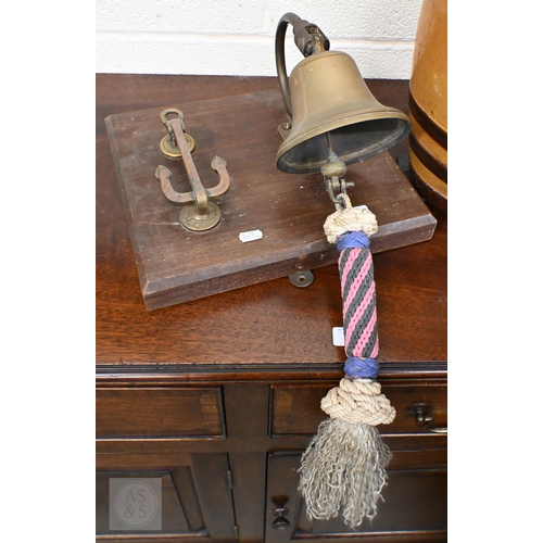 385 - Maritime interest - a vintage brass 'anchor' door knocker and bell with ropework, on teak plaque to/... 