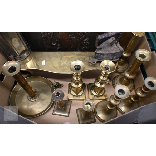 394 - A Victorian brass footman on cabriole supports and an antique oak panel carved with a heraldic Royal... 