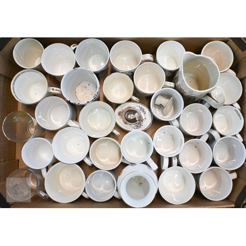 409 - A quantity of Edwardian and later ceramic and glass Royal Commemorative mugs etc (2 boxes)