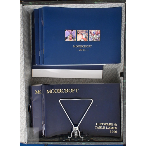 545 - A quantity of volumes and periodicals on the subject of collecting Moorcroft pottery ( 2 boxes)