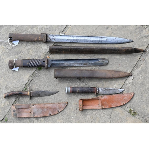 554 - Various antique and later swords, bayonets and other weapons including four fencing foils (box)