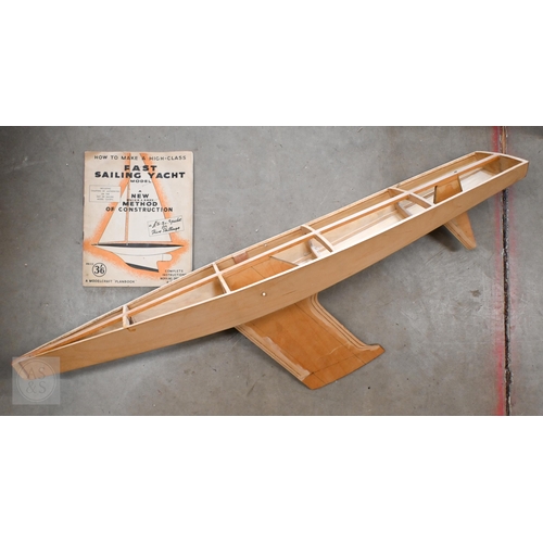 556 - #A part-finished pond yacht hull, a glider kit, etc (box)
