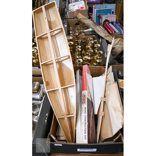 556 - #A part-finished pond yacht hull, a glider kit, etc (box)