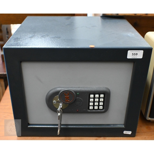 559 - An FAC digital safe (key in office), 29 x 37 x 35 cm