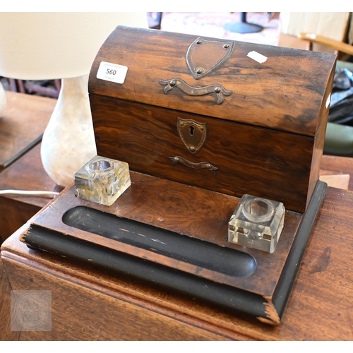 560 - A Victorian walnut and grained wood stationery box/inkstand with brass mounts, 31 cm wide
