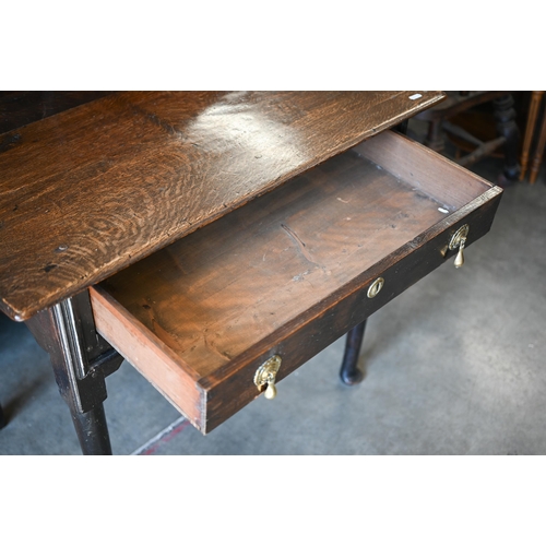 576 - An 18th century oak hall table with single drawer and turned front supports, 84 x 52 x 70 cm high