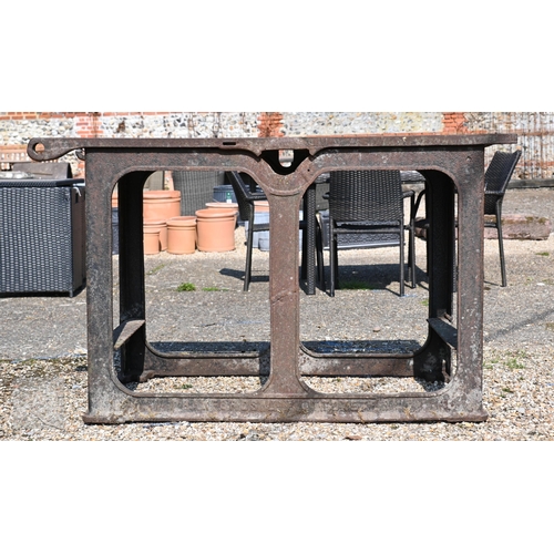 6 - Bamfords Ltd, Uttoxeter, an old weathered cast iron agricultural saw bench table, 127 cm x 61 cm x 7... 