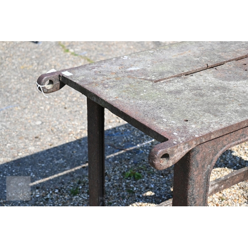 6 - Bamfords Ltd, Uttoxeter, an old weathered cast iron agricultural saw bench table, 127 cm x 61 cm x 7... 