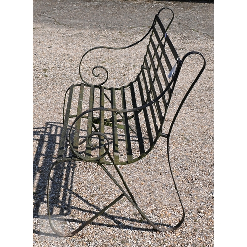 7 - A traditional Victorian style wrought iron two seat bench, 112 cm long