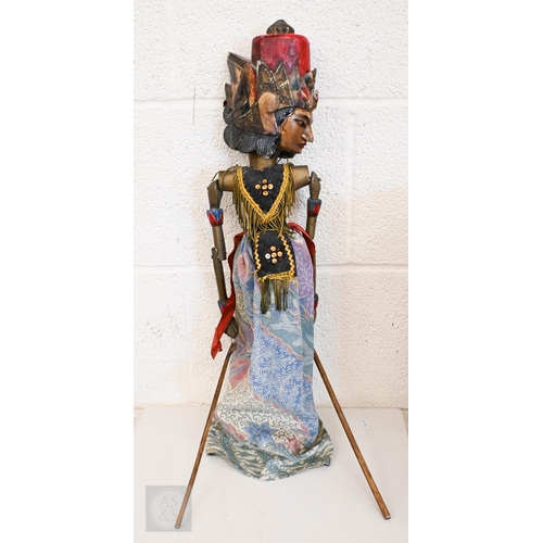 552 - Four Javanese Wayang Golek puppets with painted wooden heads - two boxed with stands, to/w a painted... 