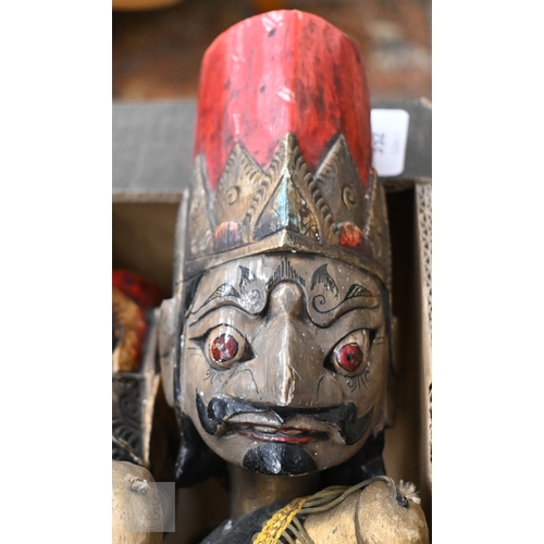 552 - Four Javanese Wayang Golek puppets with painted wooden heads - two boxed with stands, to/w a painted... 