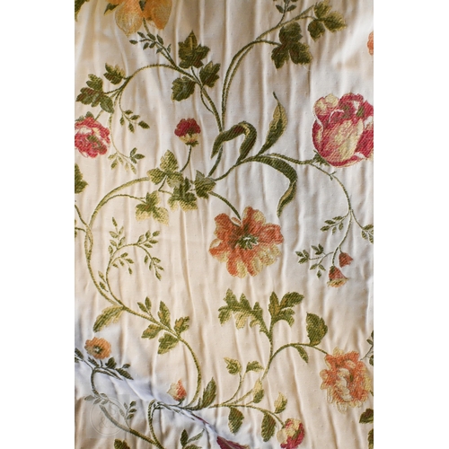 569 - Pair of lined curtains with machine-embroidered floral design on cream fabric, 181 x 170 cm drop