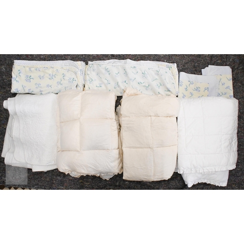 572 - ##Two vintage cream feather-filled eiderdowns/counterpanes, a white cotton embroidered bed cover, a ... 