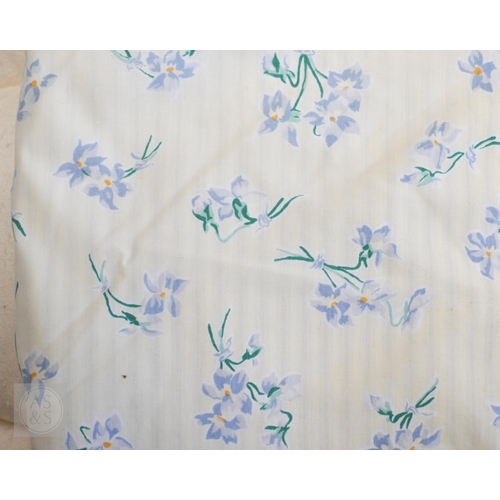 572 - ##Two vintage cream feather-filled eiderdowns/counterpanes, a white cotton embroidered bed cover, a ... 