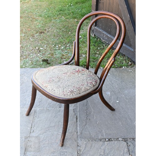 259 - #An antique beach spindle back rocking chair to/w Thonet style bentwood children's chair (2)