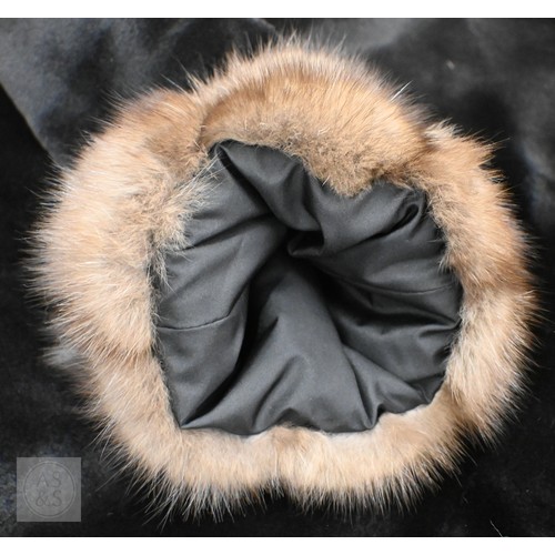 574 - A fur-timmed reversible long coat in black to/w a mid length fox fur jacket (2)