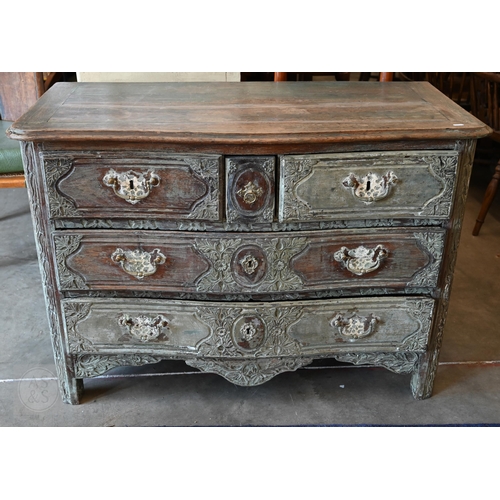 An antique French five-drawer oak serpentine front commode presented in part stripped lime washed finish, 114 x 55 x 80 cm high