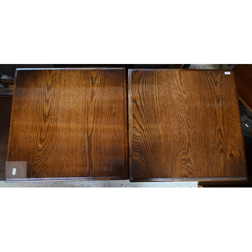 63 - A pair of square oak lamp tables in the Old Charm manner, 45 cm x 45 cm x 46 cm h (2)
