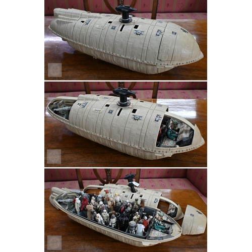 299 - Star Wars, a model rebel transport ship by Kenner/Lucas Films, 1982, c/with thirty six assorted figu...