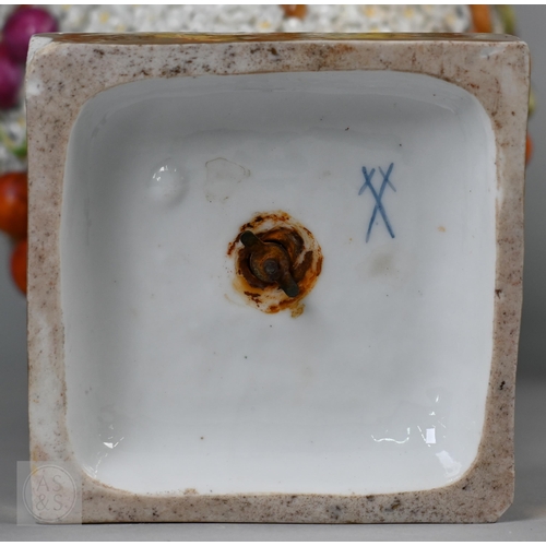 335 - A pair of 19th century porcelain floral-encrusted vases, applied with birds and fruit, on square bas... 