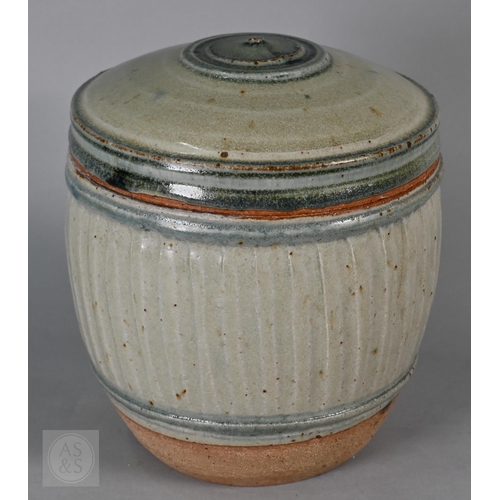 374 - Richard Batterham (English 1936-2021), a celadon-glazed jar and cover of bulbous form, 18.5cm high, ...