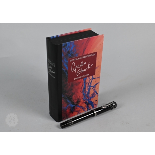 A Mont Blanc Agatha Christie limited edition Meisterstuck Writers Edition fountain pen, the sterling silver clip in the form of a snake with ruby eyes, 18k gold nib, in original box, no. 07982/30000