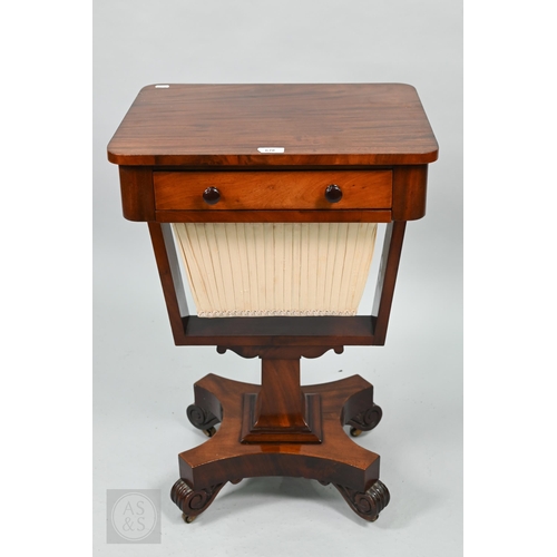 50 - A Victorian mahogany work table, the rectangular top with frieze drawer over a tapering pleated silk... 