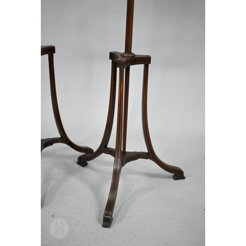 52 - A close matched pair of Sheraton design line inlaid tri-form base pole screens, the rise and fall gl... 