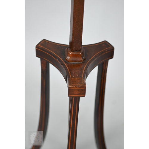 52 - A close matched pair of Sheraton design line inlaid tri-form base pole screens, the rise and fall gl... 