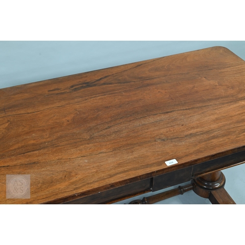 53 - A Victorian rosewood centre table, the rectangular top with rounded corners over a frieze drawer and... 