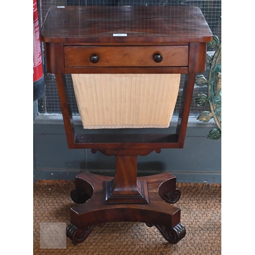 50 - A Victorian mahogany work table, the rectangular top with frieze drawer over a tapering pleated silk... 