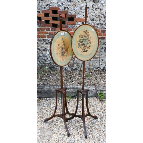 52 - A close matched pair of Sheraton design line inlaid tri-form base pole screens, the rise and fall gl... 