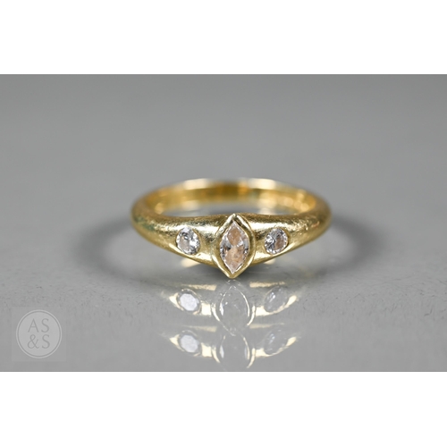 154 - An 18ct yellow gold ring set three bezel set diamonds, one of marquise-shape, flanked by two circula... 