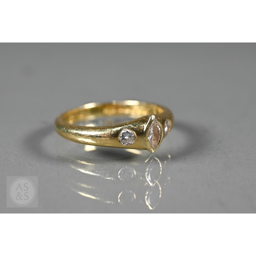 154 - An 18ct yellow gold ring set three bezel set diamonds, one of marquise-shape, flanked by two circula... 