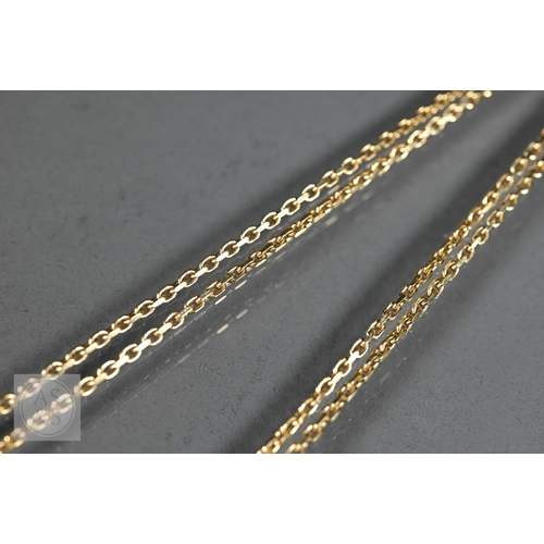 156 - An 18ct yellow gold pendant with tear-shaped blue sapphire and two collet-set diamonds above, on 18c... 