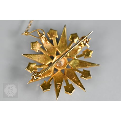 183 - A Victorian 9ct yellow gold starburst brooch set overall with seed pearls and a central old cut diam... 