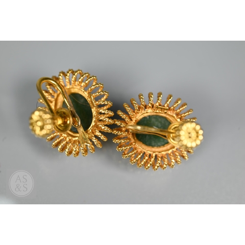 185 - A green jade bead necklace with yellow metal beads and clasp, stamped 14k; another green jade neckla... 