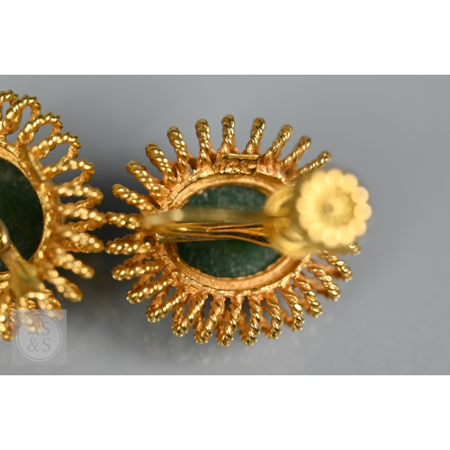 185 - A green jade bead necklace with yellow metal beads and clasp, stamped 14k; another green jade neckla... 