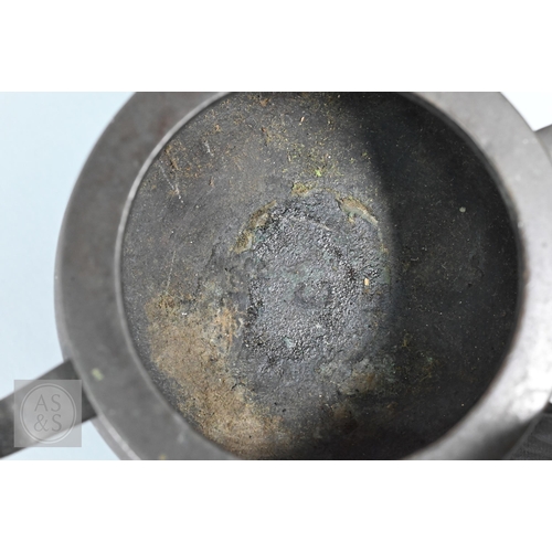 310 - A 17th/18th century Chinese bronze censer (incense burner) and original stand, the censer with compr... 