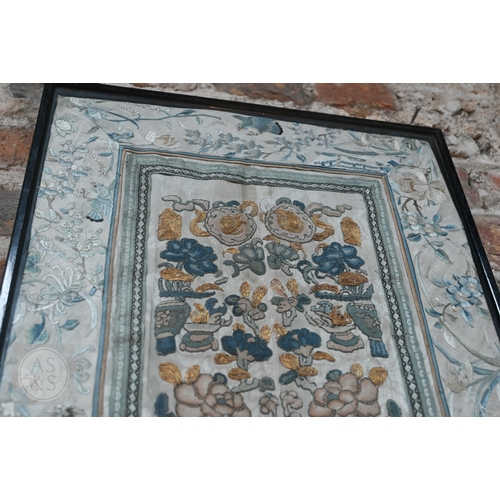 339 - Two framed late 19th or early 20th century Chinese silk embroidered panels, the first possibly a dow... 