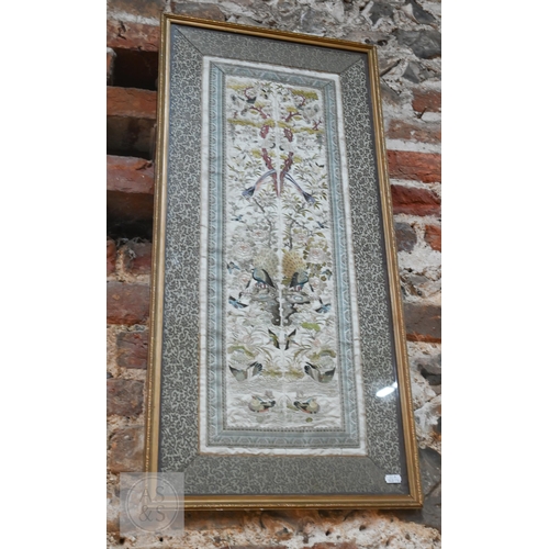 339 - Two framed late 19th or early 20th century Chinese silk embroidered panels, the first possibly a dow... 