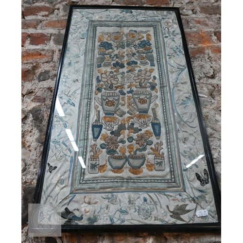 339 - Two framed late 19th or early 20th century Chinese silk embroidered panels, the first possibly a dow... 