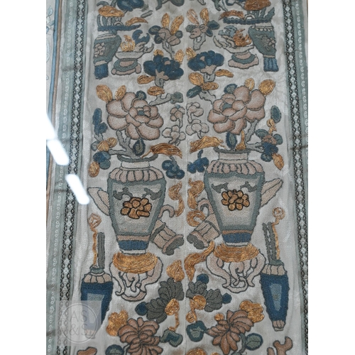 339 - Two framed late 19th or early 20th century Chinese silk embroidered panels, the first possibly a dow... 