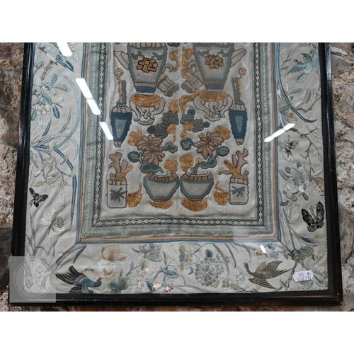 339 - Two framed late 19th or early 20th century Chinese silk embroidered panels, the first possibly a dow... 